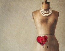 Antique dress form with vintage look background